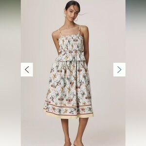 Anthropologie Smocked Peplum Midi Animal Dress